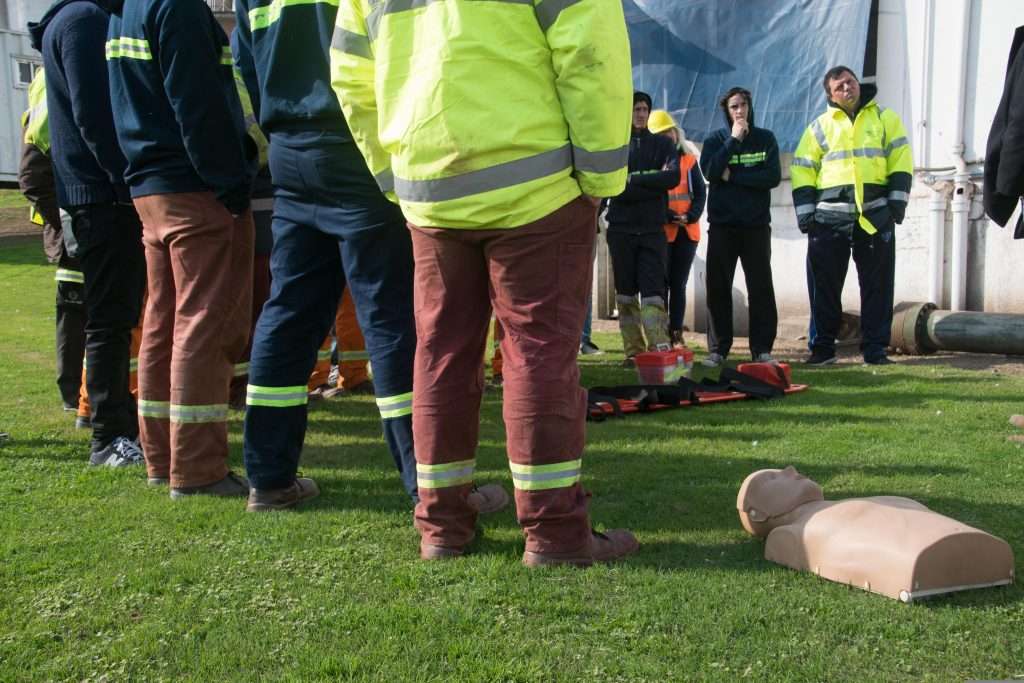 a group of construction workers undergoing health and safety training