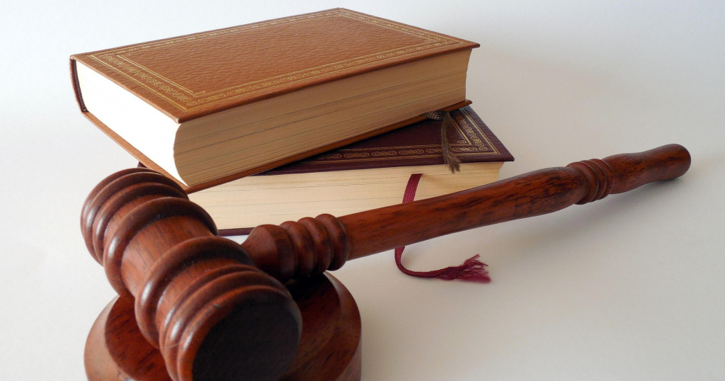 a gavel with some unmarked books